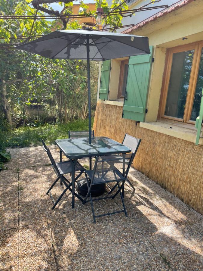 Appartement Avec Jardin Privatif อฌักซิโอ้ ภายนอก รูปภาพ